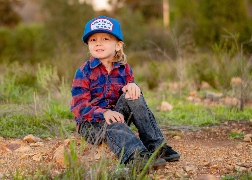 Blue White Patch Knuckleheads Trucker Hat